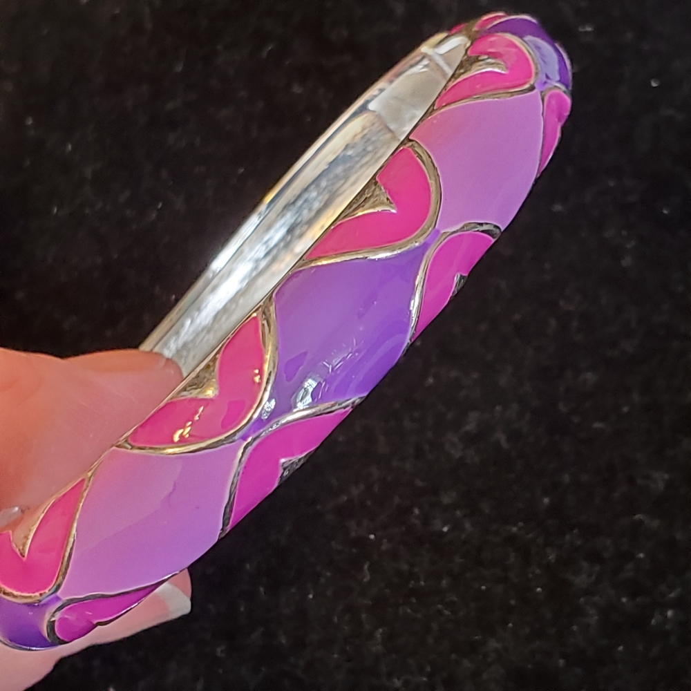 Nina Ricci silvertone stretch bangle bracelet with purple enamel design